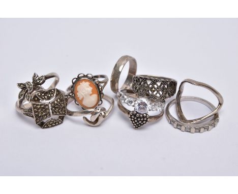 A BAG OF ASSORTED SILVER AND WHITE METAL RINGS, to include ten rings of various designs, such as a silver cameo ring depictin