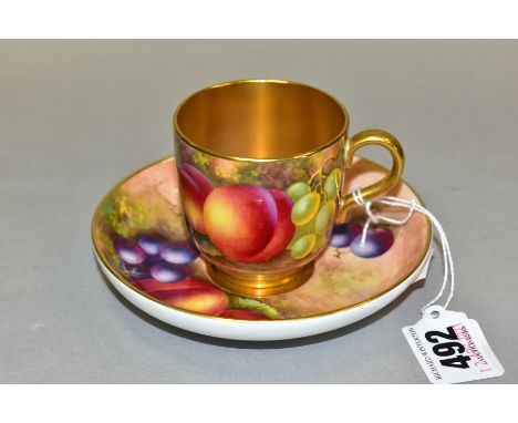 A ROYAL WORCESTER PORCELAIN CABINET FRUIT STUDY COFFEE CUP AND SEPARATE SAUCER, both decorated with peaches and grapes, with 