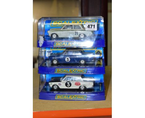 THREE BOXED SCALEXTRIC FORD LOTUS CORTINA SALOON CARS, No.71 Jim Clark, (C2913) 1964 East African Safari Rally (C3096), and 1