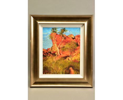 ROLF HARRIS (AUSTRALIAN 1930) 'SUN ON DEVIL'S MARBLES', a limited edition print of an Australian landscape 86/195, signed bot