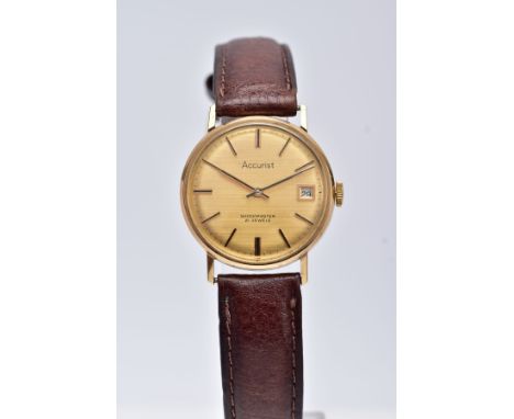 A 9CT GOLD GENTS 'ACCURIST' WRISTWATCH, hand wound movement, round gold dial signed 'Accurist, shock master, 21 jewels', date