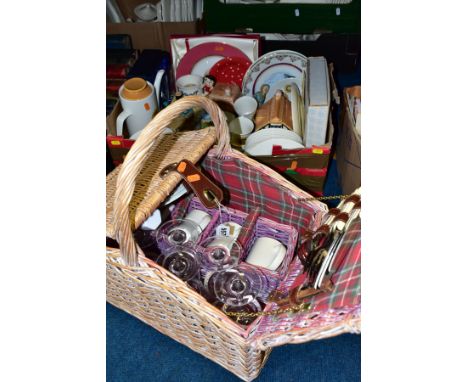 A MODERN WICKER PICNIC BASKET, containing four place settings with two extra wine glasses, together with a box of ceramics an