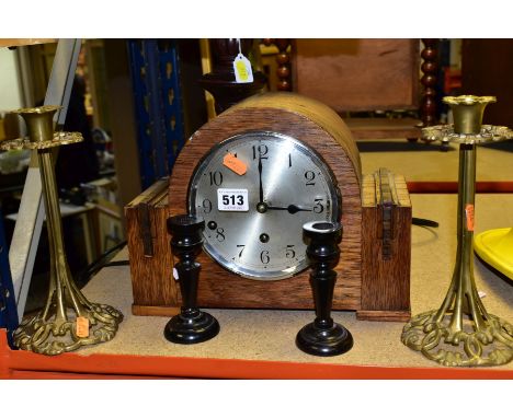 AN OAK CASED DOME TOP WHITTINGTON CHIME MANTEL CLOCK, with pendulum and key, movement overwound, pendulum arm detached, toget