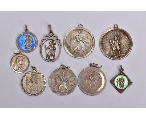 NINE SILVER AND WHITE METAL ST CHRISTOPHER PENDANTS, to include two circular pendants one fitted with a tapered bail hallmark