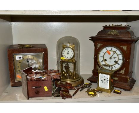FIVE EARLY/MID 20TH CENTURY CLOCKS, comprising a brass carriage clock, unbranded, winds and runs, Junghans mantel clock, wood
