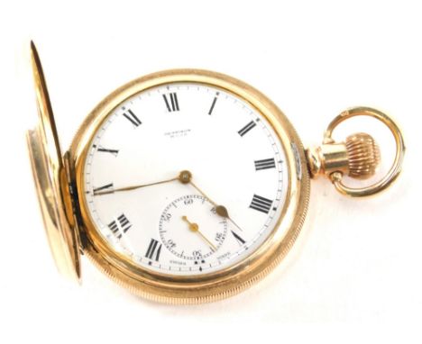 An early 20thC gold plated hunter pocket watch, partially engine turned with vacant cartouche market Moon, 6cm high.
