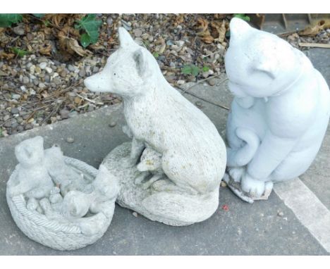 Three composition garden ornaments, one in the form of a cat and kittens and a fox etc.