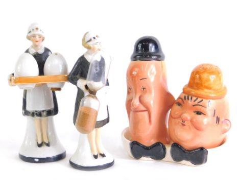 A Beswick Laurel and Hardy cruet set, and two Continental bisque porcelain maid figures, cruet set and egg timer, 12cm high. 