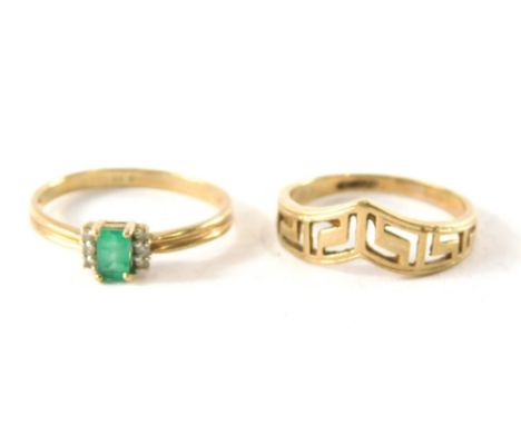Two dress rings, comprising a 9ct gold emerald and cz set dress ring, with reeded design shoulders, ring size R½, and a 9ct g