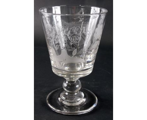 A late 19thC/early 19thC Masonic glass rummer, etched with devices, flowers and scrolls, bell shaped bowl, circular knop, on 