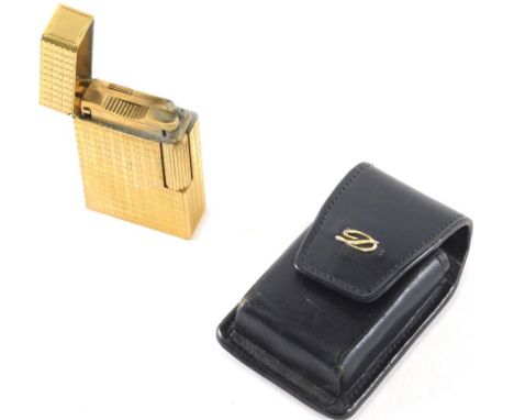A Dupont gold plated pocket lighter, of engine turned square design, 6cm high. (cased)  