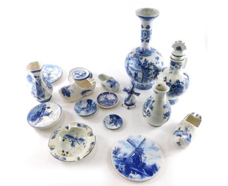 Various 20thC Delft pottery, vase, decorated with panels of windmills, with floral pattern, 33cm high, clog, saucers, etc. (a