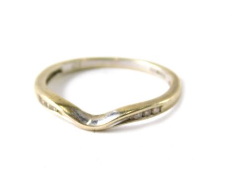 A 9ct white gold wishbone ring, set with six round brilliant cut tiny diamonds, with wish bone design centre, ring size K½, 1
