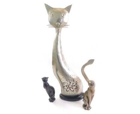 A modern hammered metal folk art style figure of a standing cat, with part pierced body, 59cm high, a Shudehill gift ware cat