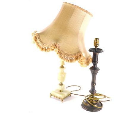 An onyx table lamp, with gilt metal mounts and material shade with a modern electrical fitting, 61cm high and a further metal