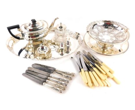 A collection of silver plated ware, to include oval galleried two handled tray with pierced borders, an engraved basket decor