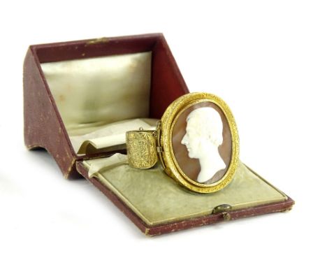A late 19thC shell cameo bangle, with conversion links for a brooch and a pendant, the cameo depicting a male head and should
