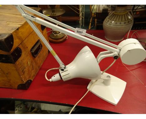 A white Anglepoise lamp.