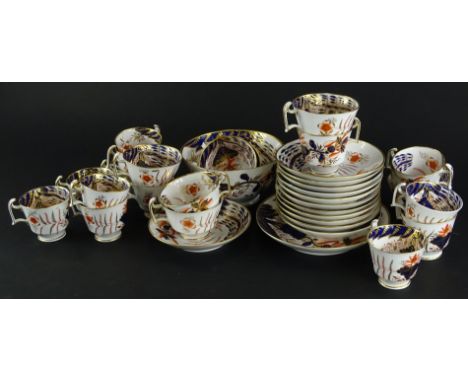 A 19thC Spode part tea and coffee service, decorated with flowers, leaves, etc., in Imari colours, to include two sizes of cu