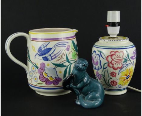 Three items of Poole pottery, a large jug decorated with flowers, birds in typical manner, printed mark in grey to underside,