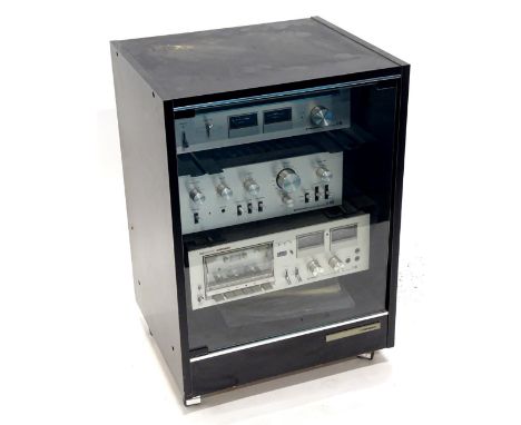 Vintage hi-fi, to include a Pioneer stereo tuner TX606, Pioneer amplifier SA-75002 and a tape deck CT-606, in hi-fi cabinet.