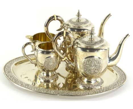 A five piece white metal tea and coffee service, the coffee pot 22cm high, water jug, milk jug and two handled sugar bowl, ea