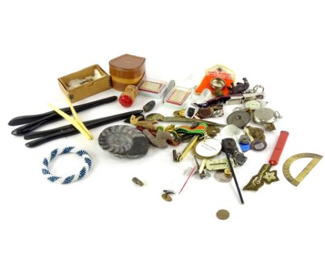 A collection of small items, to include Abraham Lincoln, a centenary medallion, American coins, some military pressed metal b