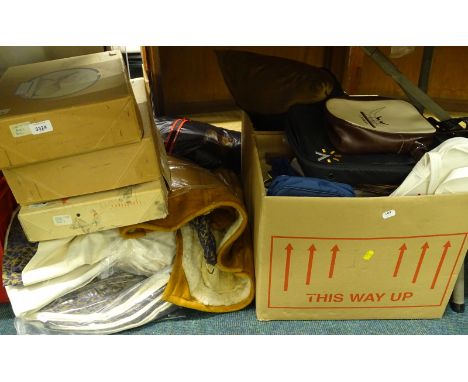 A quantity of textiles, to include gold and blue curtains with tiebacks, sheepskin coat, large quantity of handbags, etc.