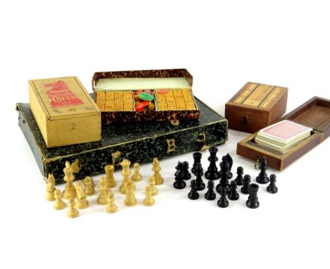 Two inlaid cribbage boards, to include an early 20thC example, decorated in ivory, a Housemartin Staunton boxwood chess set a