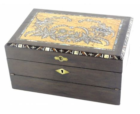 A late 19thC ebony jewellery box, the hinged lid inlaid with flowers, birds, leaves, etc., in ebony mother of pearl and brass