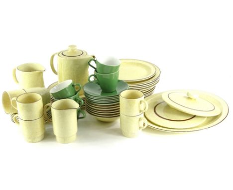 Various items of Poole pottery, to include an oven to tableware part dinner and coffee service and various green glazed cups 