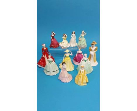Eight Coalport ladies, two Royal Doulton and two Worcester figures (12)