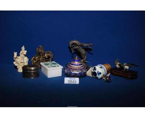 A small quantity of miscellaneous including two metal magpies, bare back riding figure, a heavy metal figure of an oriental m