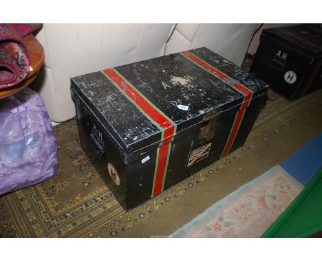 A vintage metal travelling Trunk with labels, 35'' x 21'' deep x 19 1/2'' tall.  