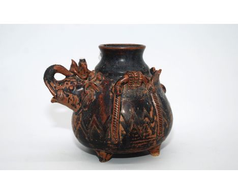A heavy ceramic oriental Vessel in the form of a man riding an elephant (the gent's head needs re-fixing), 6 1/2" tall x 7 1/