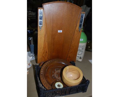 A small quantity of treen including a fire screen, tray, barometer in ship wheel, and wooden bowl.