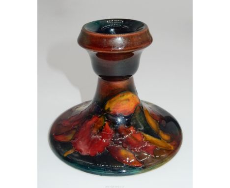 A Moorcroft dumpy Candlestick with Orchid flower, 3 1/2" tall.