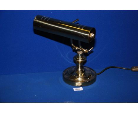 A brass finished Bankers lamp, 12'' tall.