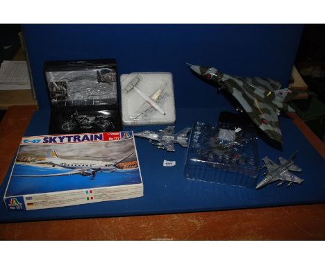 A quantity of scale models including a boxed 'Connie' plane, scale 1:2000, Altaya Hawker Hunter, Norton Commando 750 fastback