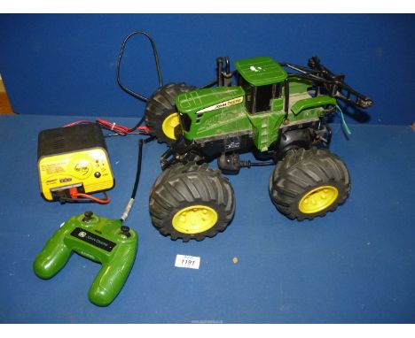 A John Deere remote control Tractor in working order, including charger.