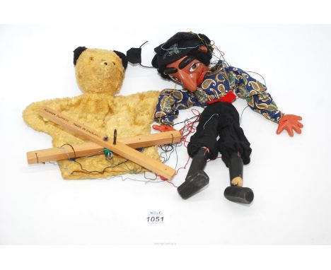 A Sooty hand puppet together with a S.M. pirate Pelham puppet.