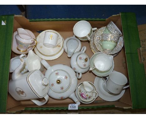 A quantity of part teasets including Royal Stafford in green and gold, Bavarian teapot, sugar bowl and jug, Royal Doulton cof