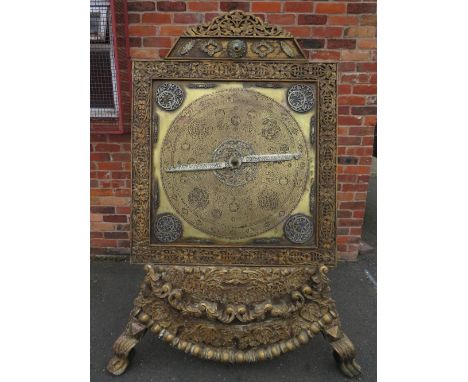 A LARGE 19TH CENTURY FLOOR STANDING OTTOMAN ASTROLABE, comprising a heavily ornate carved easel mount supporting the carved a