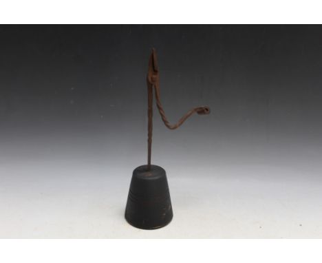 A RUSH LIGHT HOLDER, H 33.5 cm