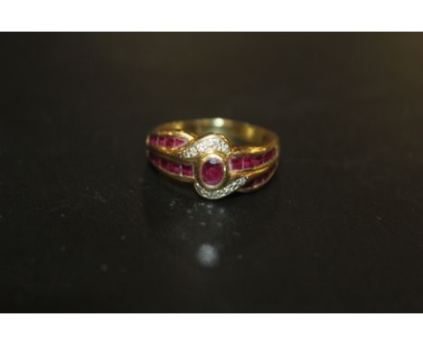 A RUBY AND DIAMOND CLUSTER RING, set in yellow metal stamped 750, approx weight 6.8g, ring size O 1/2