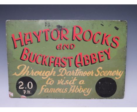 A VINTAGE ENAMELLED METAL ADVERTISING SIGN FOR 'HAYTOR ROCKS &amp; BUCKFAST ABBEY' COACH COMPANY, H 30 cm, W 46 cm
