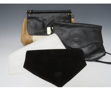 AN UNUSUAL VINTAGE LADIES LONGCHAMP LEATHER HANDBAG, having three interchangeable zip on front holdover flaps, together with 