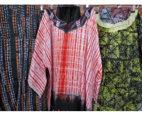 A COLLECTION OF THREE MID CENTURY&nbsp;&amp; LATER&nbsp; AFRICAN AGBADA KAFTAN ROBES, comprising a tie dyed robe having black