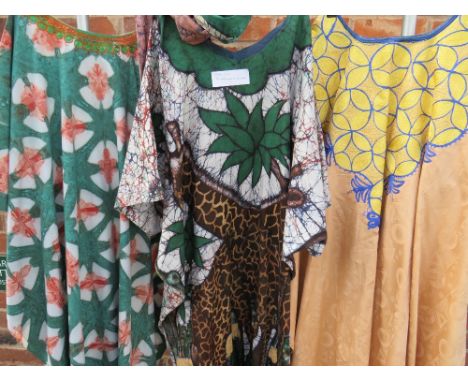 A COLLECTION OF THREE MID CENTURY&nbsp;&amp; LATER&nbsp;AFRICAN AGBADA KAFTAN ROBES, comprising a Sierra Leone tie dyed 1980s