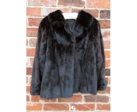 A VINTAGE CHOCOLATE BROWN MINK FUR JACKET, fully lined, two pocketsCondition Report:Underarm to underarm laid flat approximat